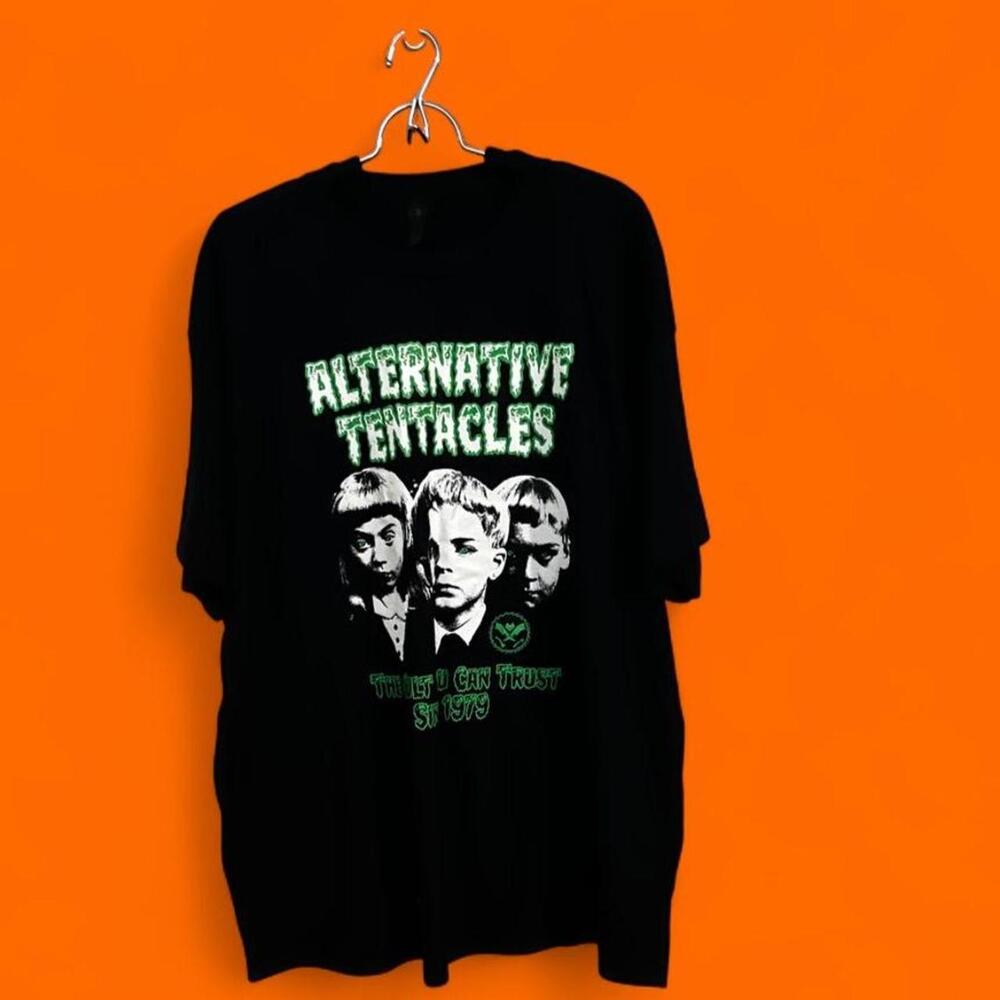 Black Alternative Tentacles patreon tee with green text and three faces graphic,